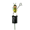 Garden metal bee with catching butterfly net standing on watering can fence stakes